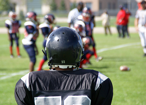 Common Spinal Injuries While Playing Football and How to Avoid Them